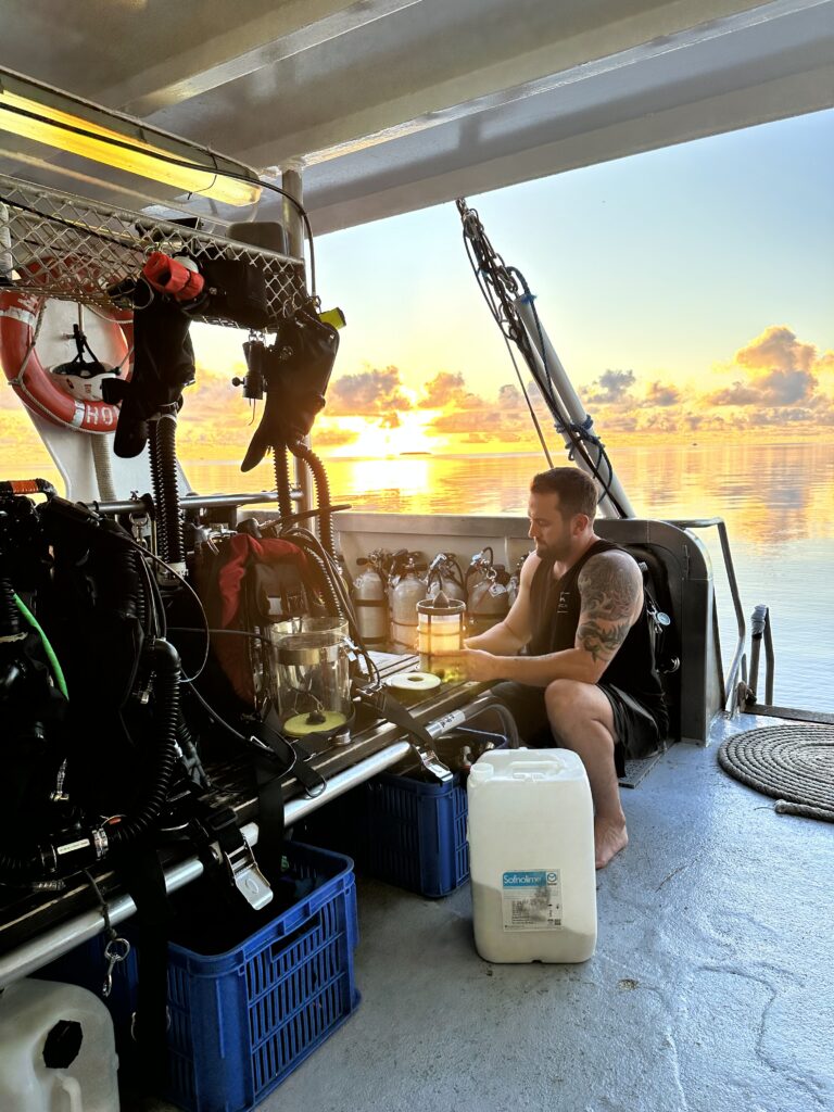 Topside image, preparing for rebreather dive, photo by Adam Bead Photography